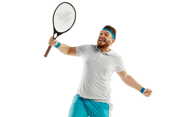 Funny emotions of professional tennis player isolated on white studio background, excitement in game - Фото, зображення