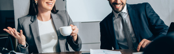 Cropped view of smiling businesspeople with coffee in office, banner  - Photo, Image