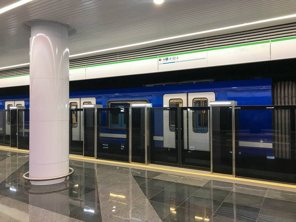 subway with increased security. new metro stations. double security, automatic doors before entering the train. inside the cars there are comfortable seats and handrails. - Photo, Image