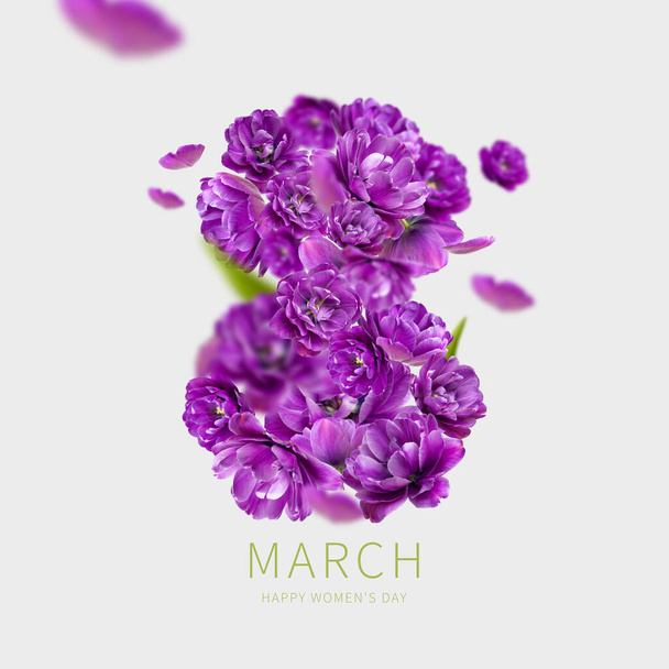 International Women's Day. Creative concept for March 8 from purple tulips. Number eight from purple flowers on light gray background. Flower card, floral composition. Spring, holiday, layout, art. - Fotó, kép