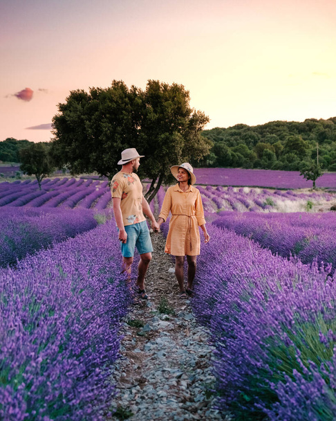 couple on vacation in the Provence France visiting the lavender fields of the Provence France - Photo, Image