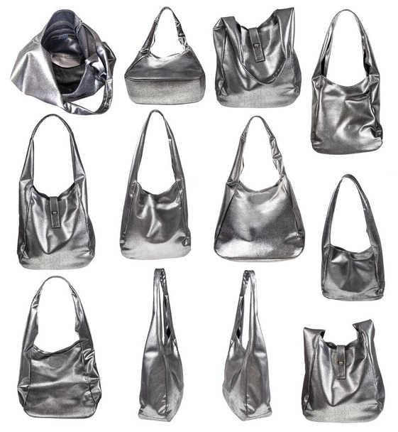 conjunto de bolsos hechos a mano de cuero plateado suave aislado sobre fondo blanco - Foto, Imagen