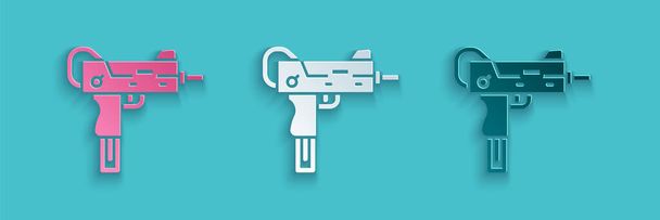 Carta tagliata icona pistola mitragliatrice UZI isolato su sfondo blu. Arma automatica. Stile cartaceo. Vettore. - Vettoriali, immagini