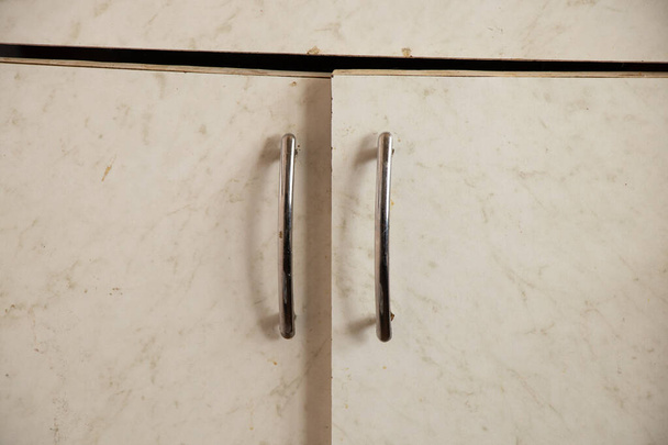 kitchen cabinet with door handle as background close up - Photo, Image