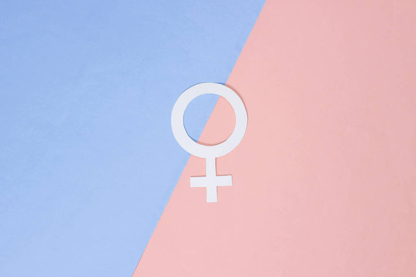 Gender symbol feminism on pastel background. Top view. Minimalism. Gender equality - Photo, Image