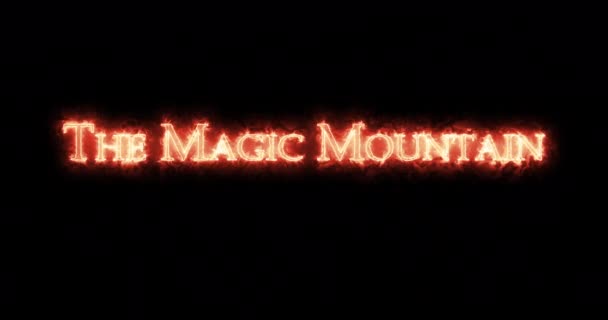 The Magic Mountain written with fire. Loop - Footage, Video