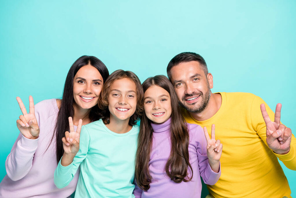 Photo portrait of big family showing v-signs isolated on vivid turquoise colored background - Fotoğraf, Görsel