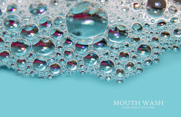 Extreme close up shot of bubbles in mouth wash liquid - Photo, Image