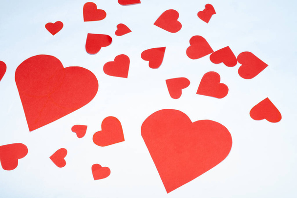 Red hearts on a white background close-up. - Foto, imagen