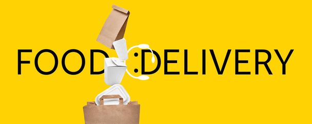 Paper bag with falling containers and text FOOD DELIVERY on color background - Photo, Image