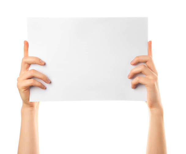 Female hands with blank business card on white background - Zdjęcie, obraz