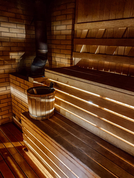 Sauna with traditional sauna accessories, steam room. Relax village bath concept - Φωτογραφία, εικόνα