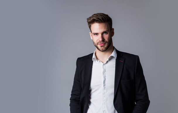 Looking trendy. well groomed hairstyle. male beauty and fashion look. formal office costume for bearded guy. unshaven handsome man with bristle. hairdresser concept. young and confident boss - Fotó, kép