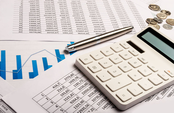 Calculator with documents on table. Paperwork and finance - Foto, Imagen