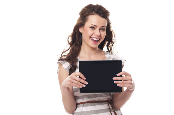 Woman showing screen of digital tablet - Photo, Image