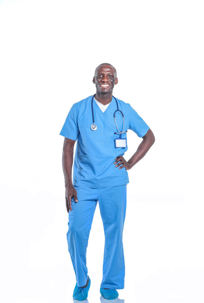 Portrait of a doctor man standing isolated on white background. Doctor. Clinic - Foto, imagen