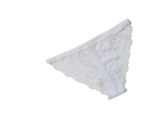 Fashion lace white women's panties isolated on white background. The concept of meeting lovers. Underwear. Fashionable concept. Flat lay. - Photo, Image