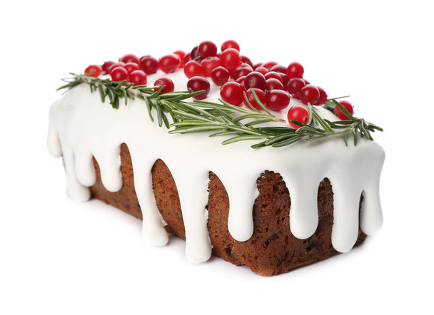 Traditional classic Christmas cake decorated with cranberries and rosemary isolated on white - Foto, afbeelding