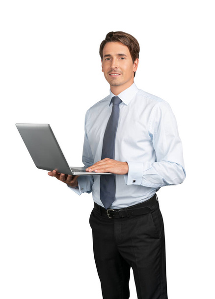 Businessman in shirt and tie with laptop isolated over white background - Foto, immagini