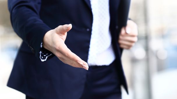 Business woman gives a handshake - Foto, immagini