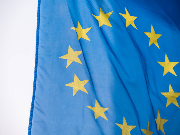 European union flag waving in the wind. - Фото, зображення