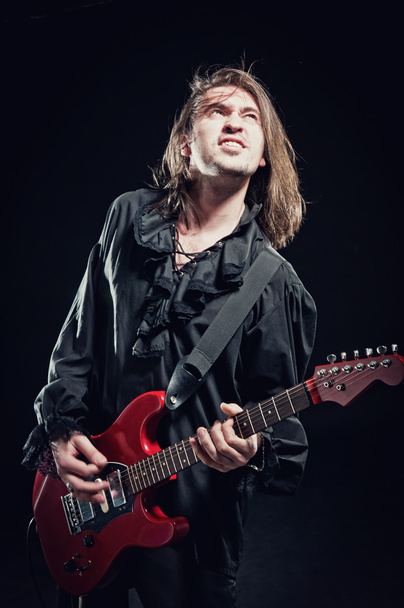 Rock-star tocando um concerto
 - Foto, Imagem