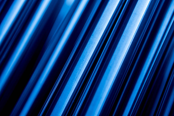 Abstract background of steel pipes stacked on a pallet - Fotó, kép