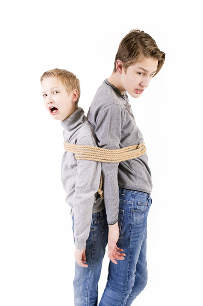 Brothers. Connected by a rope. - Foto, Bild