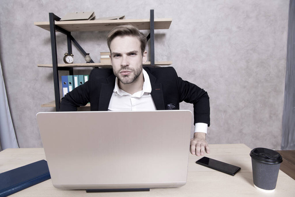 Man strict bearded boss top manager in office. Ceo concept. Leave office right now. Failed job interview. Firing employees. Serious boss picky looking at camera. Boss with laptop in bad mood - 写真・画像