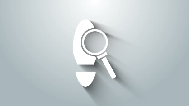 White Magnifying glass with footsteps icon isolated on grey background. Detective is investigating. To follow in the footsteps. 4K Video motion graphic animation - Footage, Video