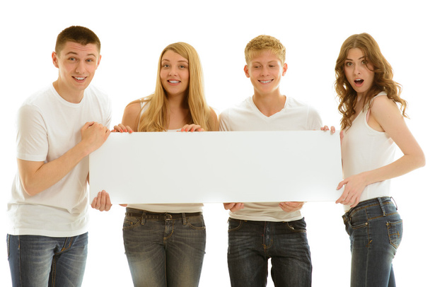 Group beautiful of happy young people with ad - Fotoğraf, Görsel