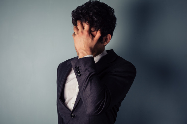 Stressed businessman with migraine - Фото, зображення