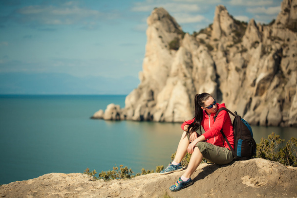 Young lady hiker with backpack - Foto, imagen