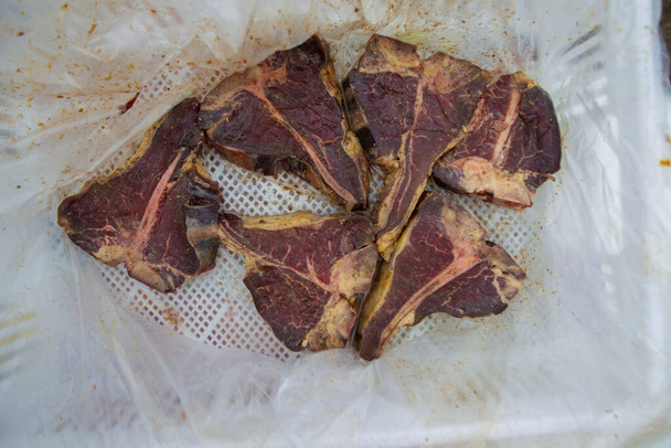 Large pieces of marinated beef of elite varieties. - Photo, Image