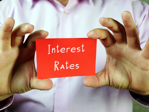  Juridical concept about Interest Rates with sign on the page - Photo, Image