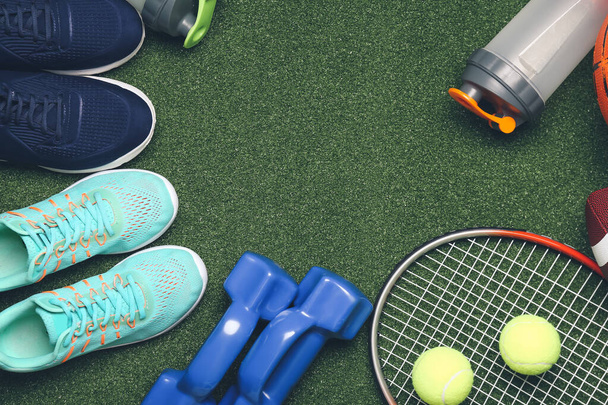 Set of sport equipment on color background - Фото, изображение