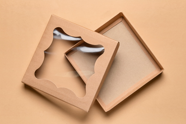 Open blank cardboard box on color background - Photo, Image