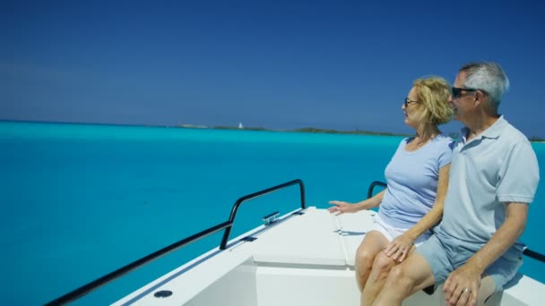 Happy senior couple on yacht enjoying sailing Bahamas - Footage, Video