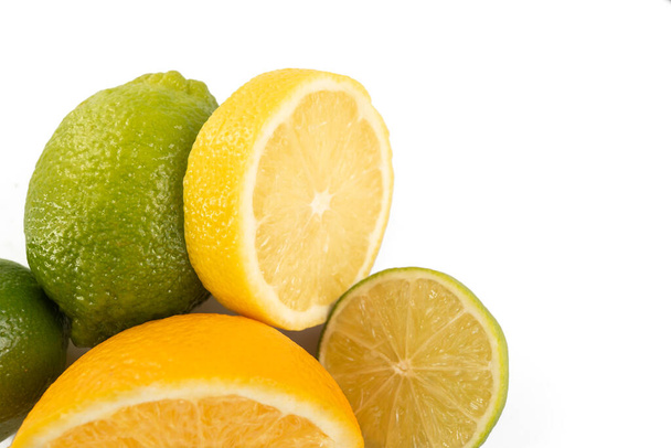 fruits kind of citrus isolated on white background. Lime, lemon, orange. - Photo, Image