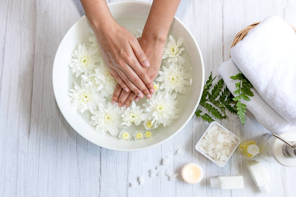 Spa beauty massage health wellness. Spa Thai therapy treatment aromatherapy for nail and hands woman with white flower nature candle for relax and summer time.  Lifestyle and cosmetic Concept - Foto, Imagem