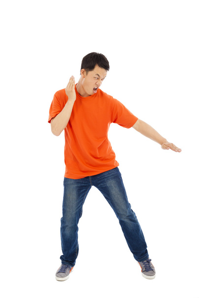 young man imitate a karate expert with fight stance - Foto, imagen