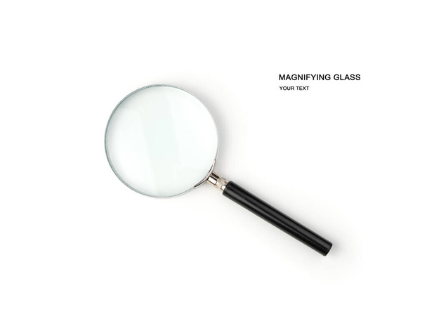 Magnifier with black handle isolated on white background. Top view with space to copy. - Photo, Image