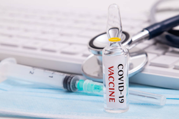 coronavirus vaccine vial in healthcare medical background - Photo, Image