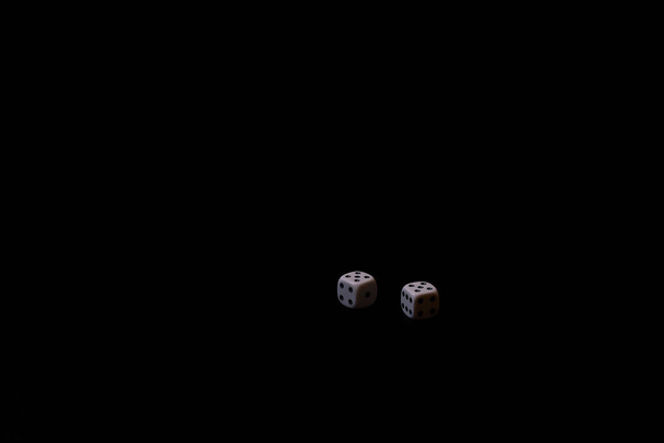Two dice on black background, empty space, double five, front view - Photo, Image