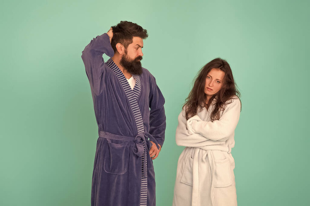 All day pajamas. Quarantine concept. Sleepy people blue background. Couple in love bathrobes. Sleep disorders. Drowsy and weak in morning. Morning routine. Couple sleepy faces clothes for sleep - Photo, Image