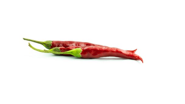 Red chili peppers on a white background. - Photo, Image
