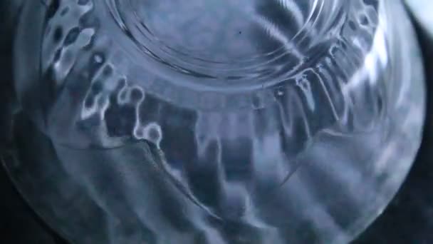 Motion effects of the glass bowl clear transparent tuning art moving on different surface shining reflection - Záběry, video