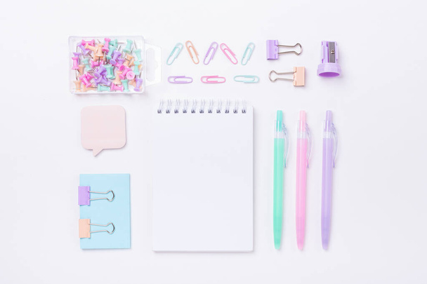 School supplies in pastel color Back to school concept Flat lay Top view - Foto, afbeelding