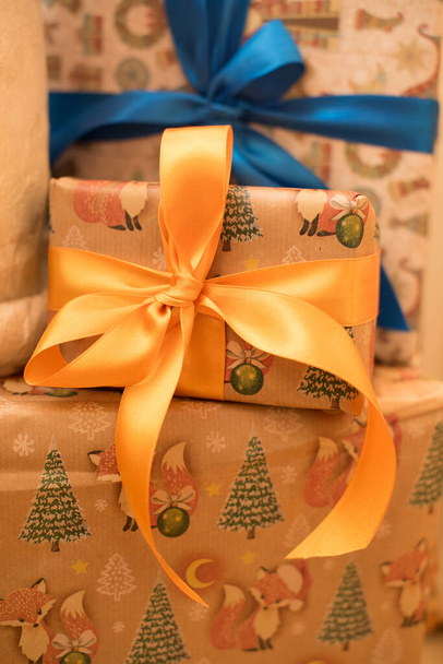 Christmas gifts on the garland background - Photo, Image
