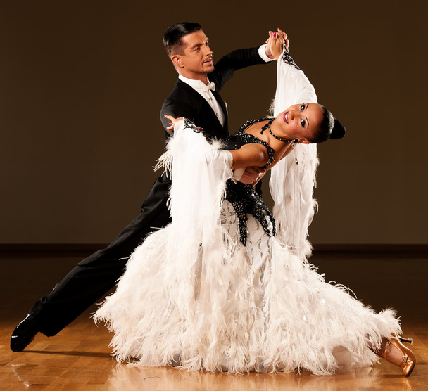  Professional ballroom dance couple preform an exhibition dance  - 写真・画像